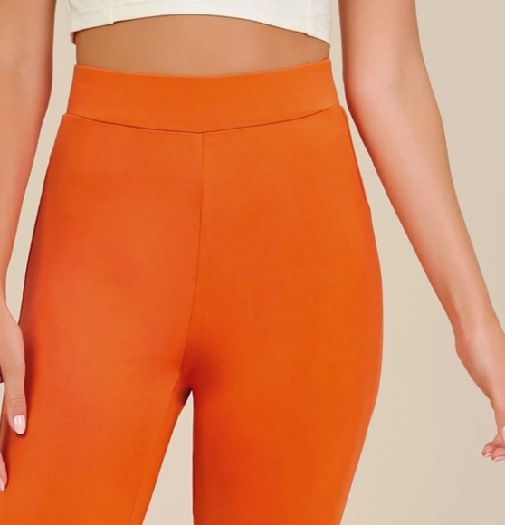 Orange solid flare pants new no tag never worn. Size Large - Picture 2 of 2